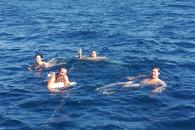 Authentic Barcelona Sailing Tour with Swim & Drinks - Drinks, snacks, and the onboard mood