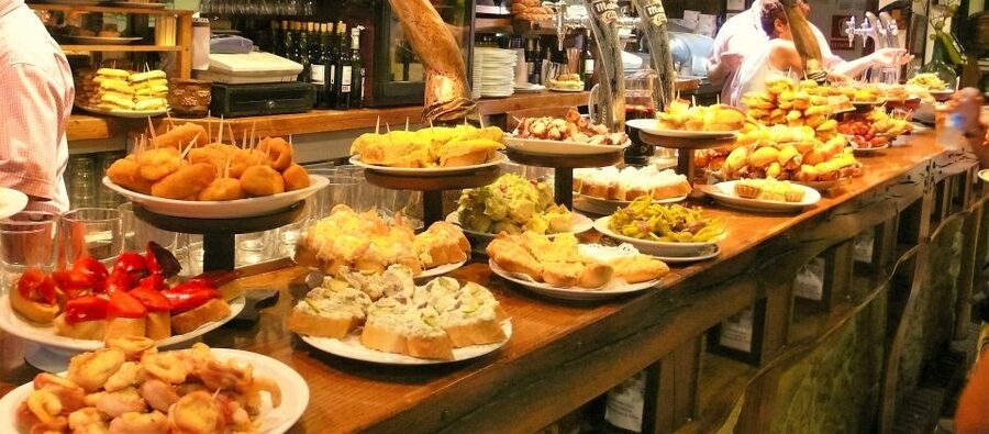 Barcelona: 4-Hour Private Market & Foodie Tour - Mediterranean tapas and the logic of shared plates