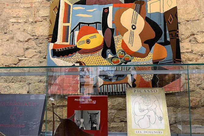 Barcelona Art and Tapas Small Group Walking Tour with Picasso Museum - Starting beneath Gaudí’s Plaça Reial lamps