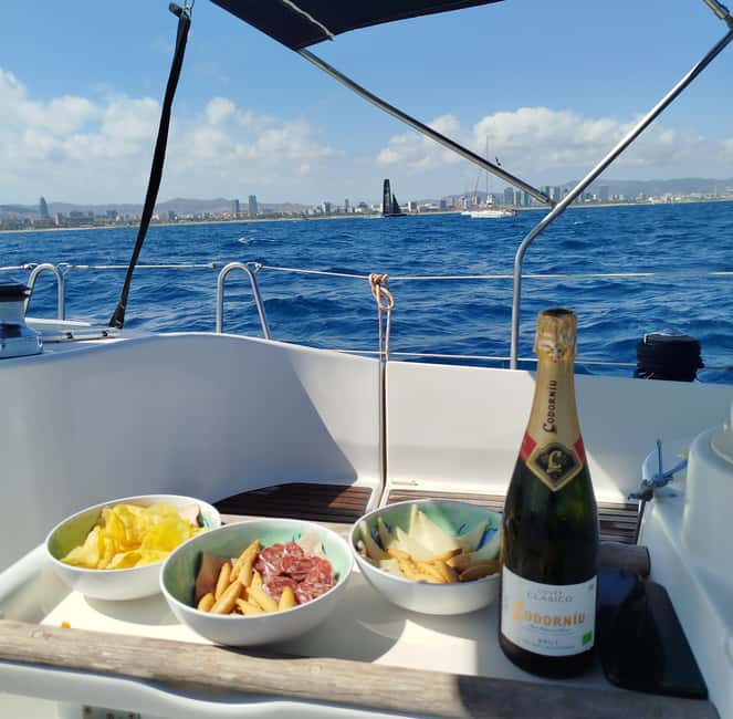 Barcelona Badalona : Sailboat Tour, Snacks, Drinks, Swimming - Sailing Along Barcelona’s Coast