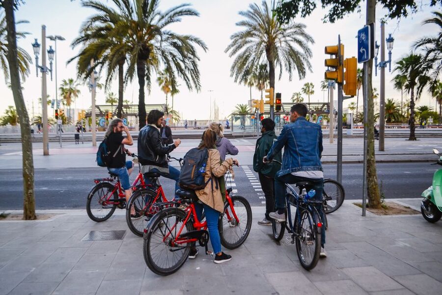 Barcelona Bike Tour by Night with Cava - The illuminated bullfighting ring and Casa Batlló