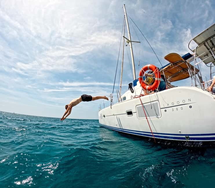 Barcelona: Catamaran Cruise w/ Sailing, Wine, & Tapa - Swimming, snorkeling, and sea conditions