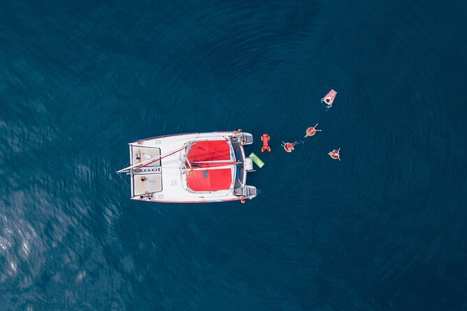 Barcelona Catamaran Cruise with Tapa & Drink Included - Sunset cruise: beautiful light, limited sightseeing