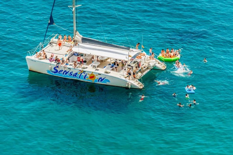 Barcelona: Catamaran Party Cruise with BBQ Meal - Sailing from Port Olímpic toward Badalona