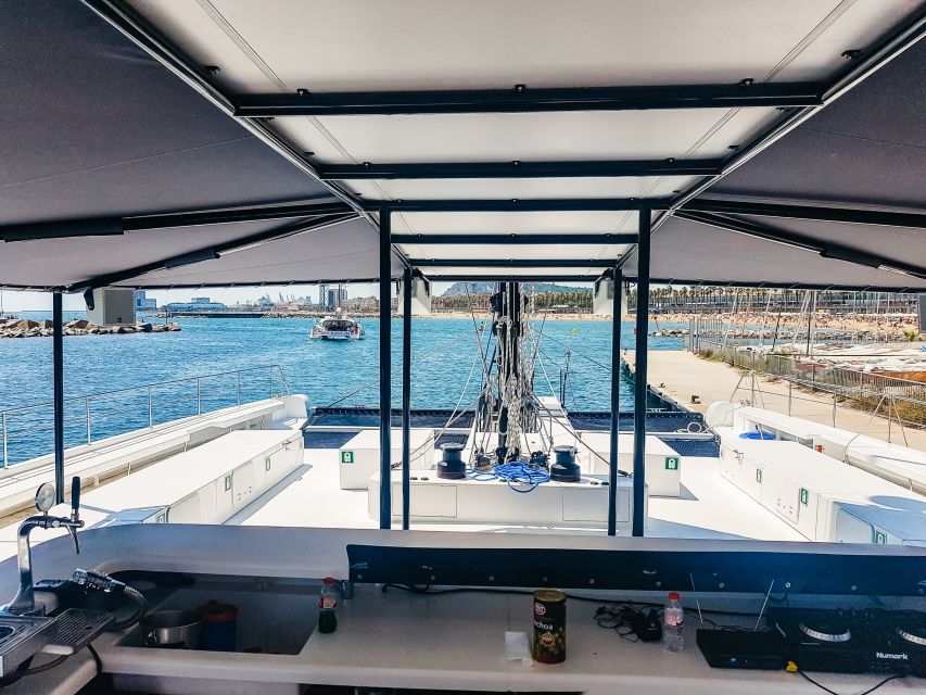 Barcelona: Catamaran Party Cruise with BBQ Meal - The Mediterranean swimming stop