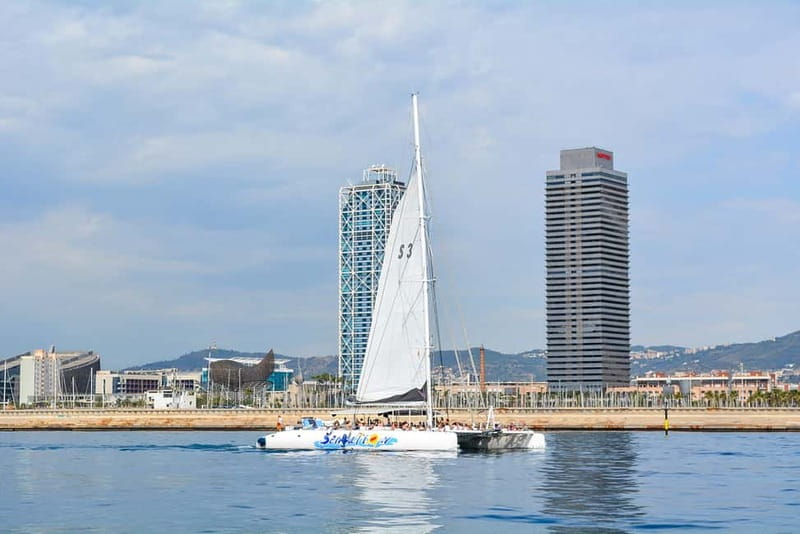 Barcelona: Catamaran Party Cruise with BBQ Meal - Music, dancing, and the crew