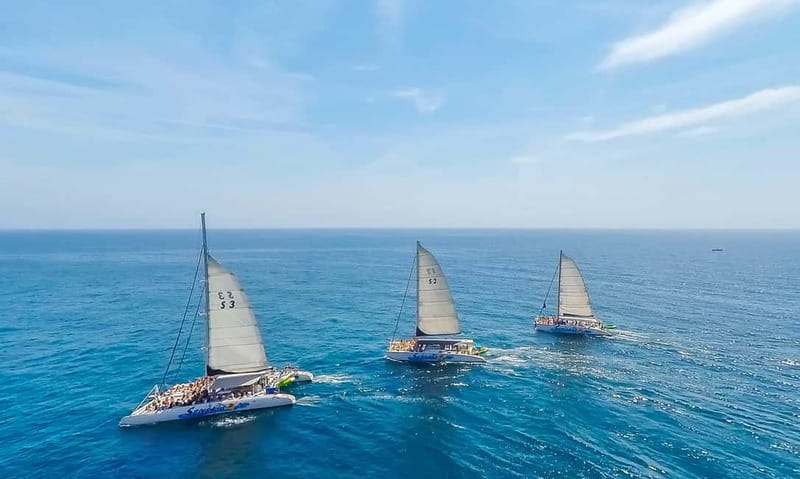 Barcelona: Catamaran Party Cruise with BBQ Meal - Picking the right departure time