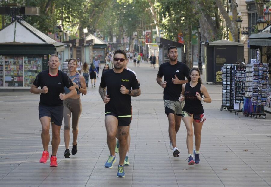 Barcelona: City Highlights Guided Running Tour - Sagrada Família provides the biggest pause