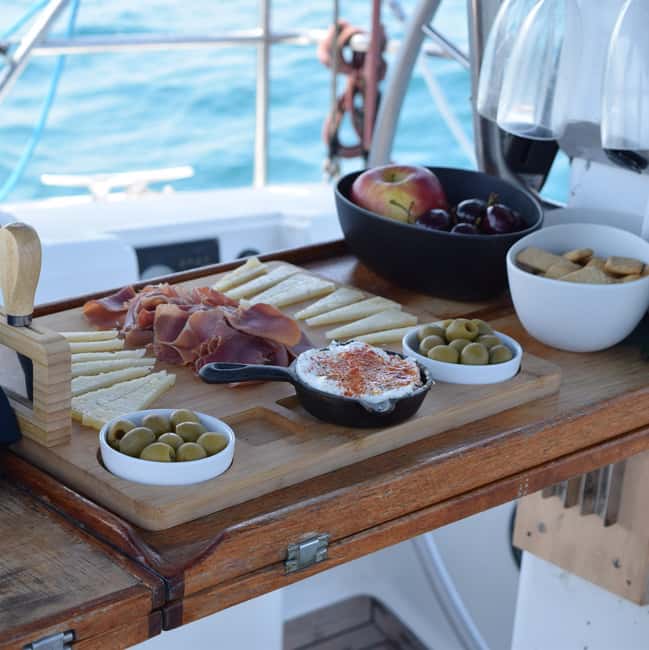 Barcelona: Coastline Sailing with Swim Toys w/ Food & Drinks - Snacks, drinks, and the relaxed onboard mood