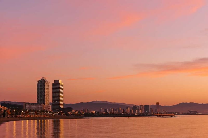Barcelona: Daytime or Sunset Cruise with Drinks - Sails, music, and the welcome drink