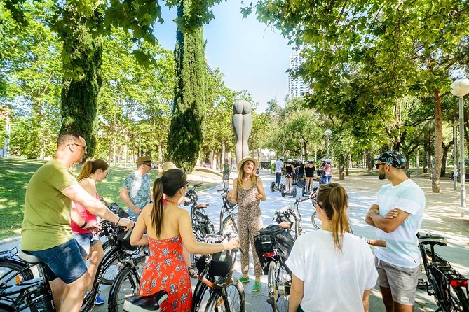 Barcelona E-Bike Small Group Tour with Tapas & Wine Tasting - Port Vell and the end of La Rambla