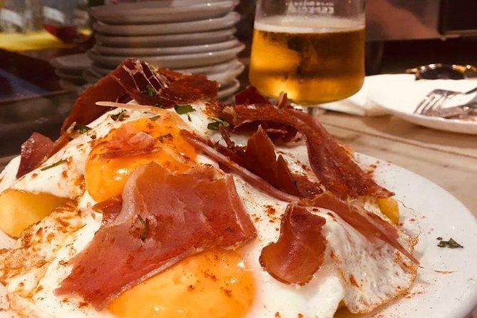 Barcelona Gothic Quarter VIP Tapas & Wine Tour - Friday through Sunday: Roman walls and a cellar bar