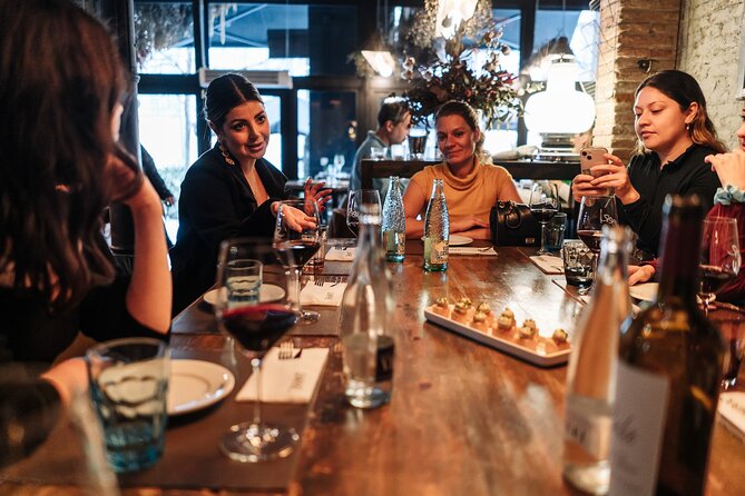 Barcelona: Guided Food Walking Tour with Tapas and Wine - Croquettes and patatas bravas on Carrer Ample