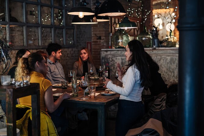 Barcelona: Guided Food Walking Tour with Tapas and Wine - Paella, cava, and dessert on Carrer d’Avinyó