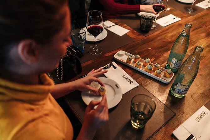 Barcelona: Guided Food Walking Tour with Tapas and Wine - Roman walls and the quiet pleasure of walking
