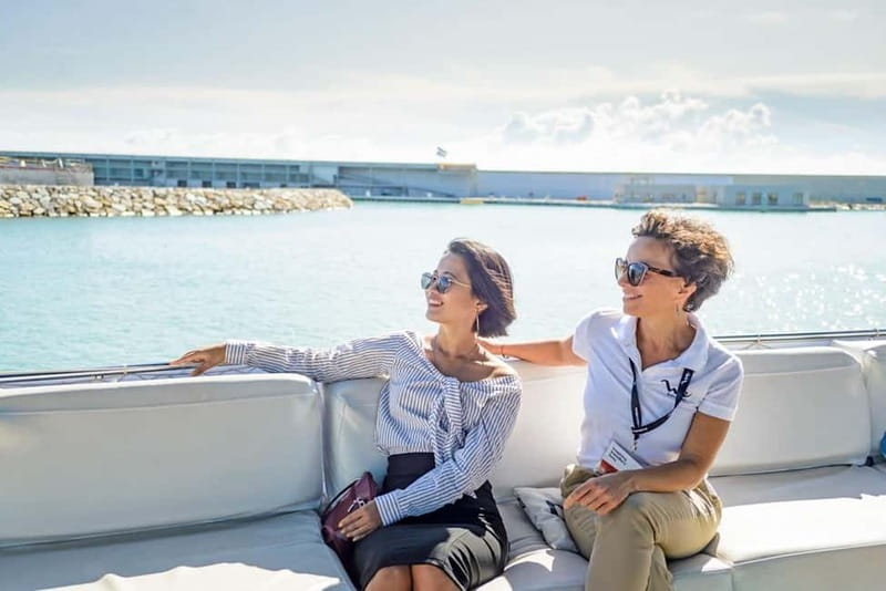 Barcelona: Helicopter Flight, Boat Ride, and Walking Tour - The change from streets to the harbor