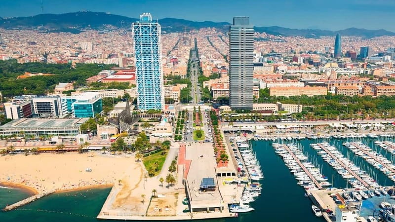 Barcelona: Helicopter Flight over Barcelona's Coastline - Port Olympic, Agbar Tower, and the modern waterfront