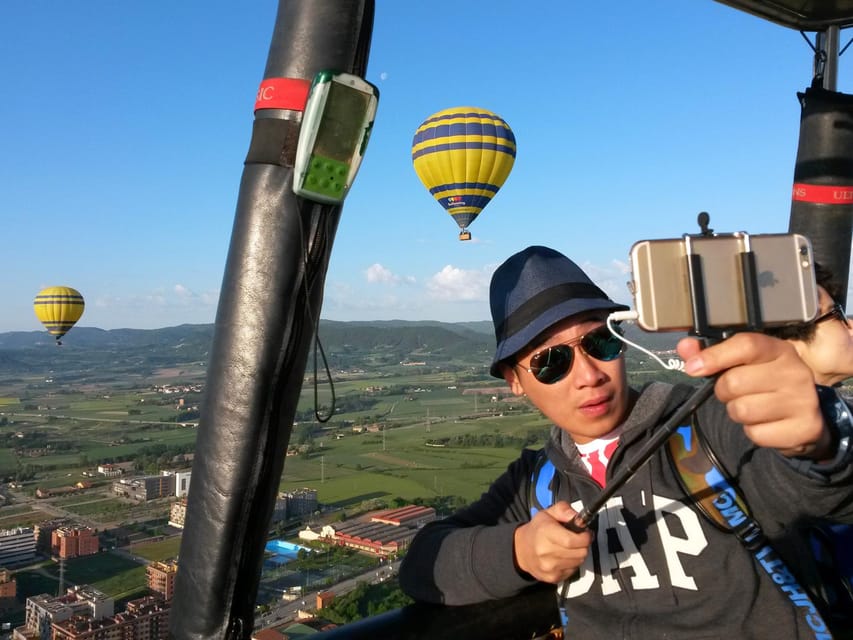 Barcelona: Hot Air Balloon Ride with Optional Transportation - The landing, Cava toast, and certificate