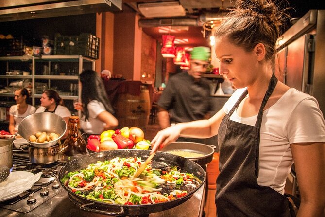 Barcelona Interactive Spanish Cooking Experience - Making seafood paella from the beginning