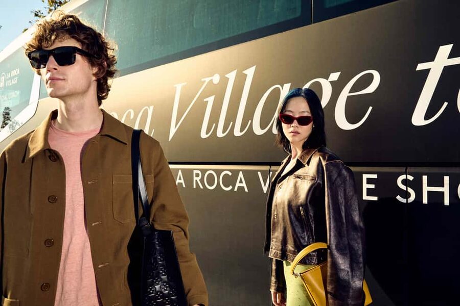 Barcelona: La Roca Village Shopping Express® Day Trip - Entering the open-air shopping village