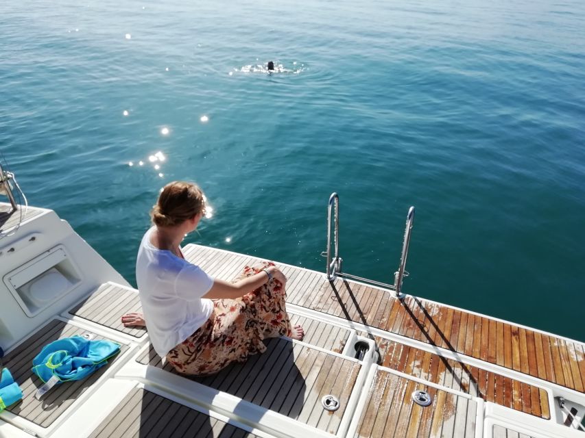 Barcelona: Luxury Private Yacht Daytime Cruise - Montjuïc Castle, the W Hotel, and the city seen offshore