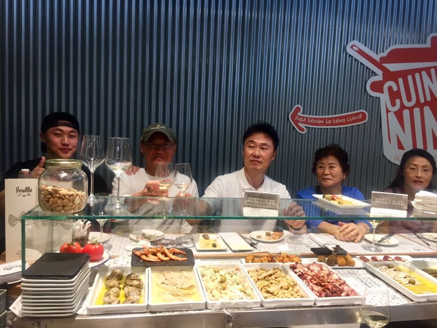 Barcelona Market Food Tour, Local & Artisanal Tastings - A family stall devoted to Catalan ham