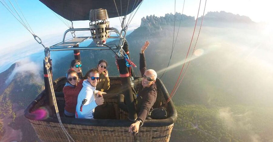 Barcelona: Montserrat Hot-Air Balloon & Monastery Experience - Helping inflate the balloon before sunrise or takeoff