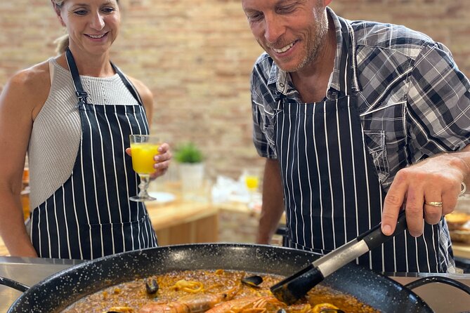Barcelona Paella Cooking Class & Boqueria & Hofmann-Trained Chefs - The Gothic Quarter walk between two settings