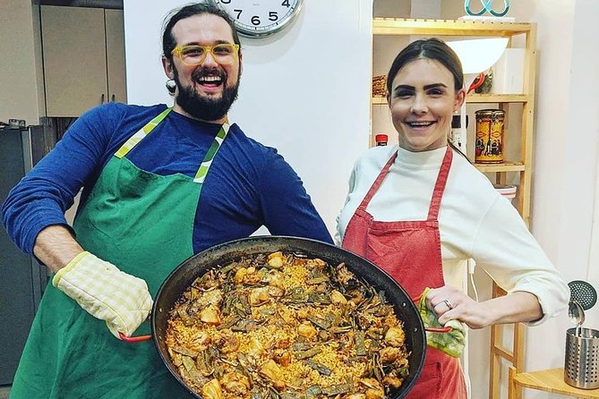Barcelona : Paella Cooking Experience + Boqueria Market Exclusive Tour - Walking from La Boqueria to Plaça de Sant Jaume