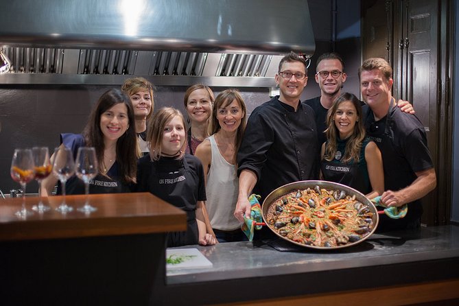Barcelona : Paella Cooking Experience + Boqueria Market Exclusive Tour - Taking your role in the paella kitchen