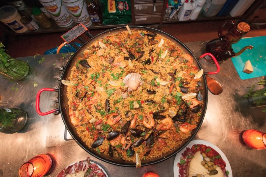 Barcelona: Paella Cooking Experience & Boqueria Market Tour - Making pan con tomate and pintxos
