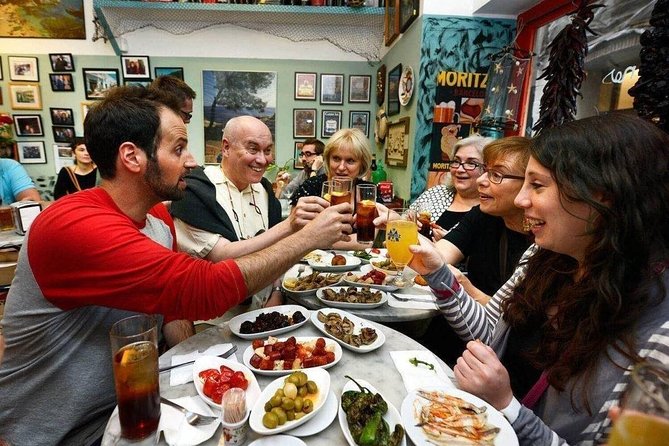 Barcelona Poble Sec Tapas & Wine Tour - A mosaic façade and the walk between plates