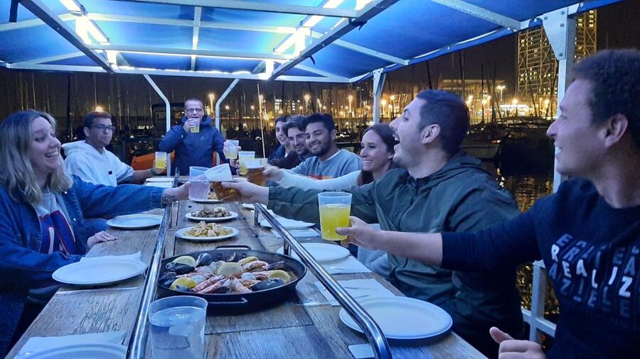 Barcelona: Private Evening Cruise with Dinner and Drinks - Leaving the port as the city changes color