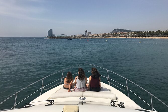 Barcelona Private Luxury Motor Yacht Sunset Cruise with Drinks - The Sagrada Família Seen From Offshore