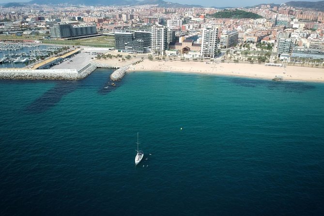 Barcelona Private Sailing Trip with unlimited drinks and snacks - Barceloneta Beach from the water