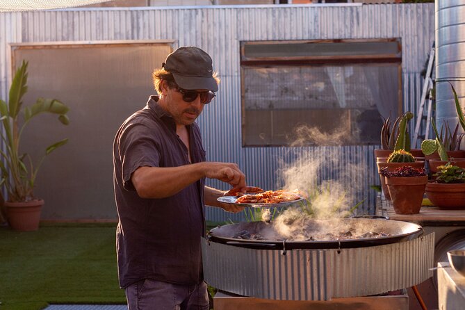 Barcelona Rooftop Paella Cooking Class with Sangria & Local Host - The rooftop setting, with one important caution