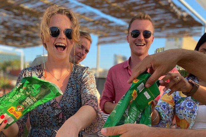 Barcelona Rooftop Paella Cooking Class with Sangria & Local Host - Sitting down to eat what you made