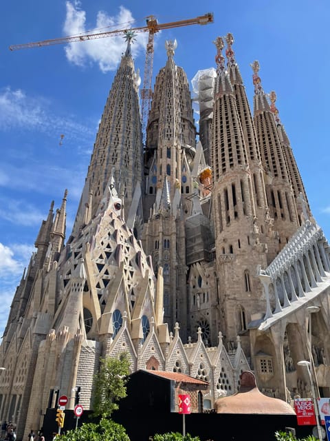 Barcelona: Sagrada Família and Park Güell Guided Tour - Entering Sagrada Família through its carved façades