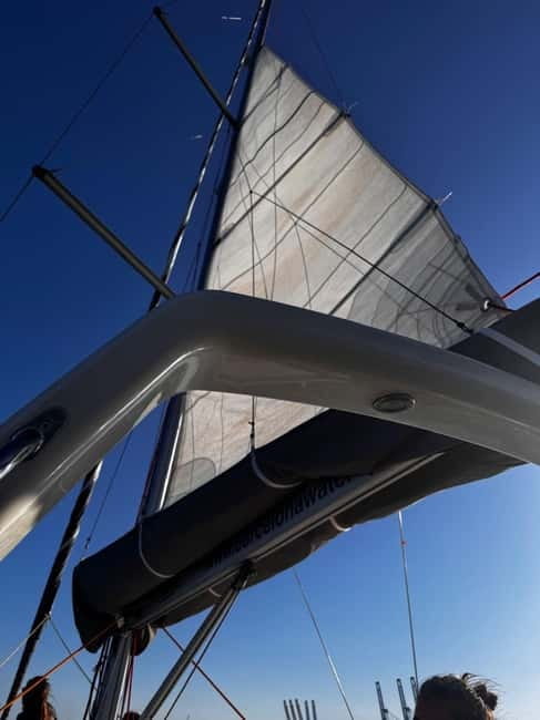 Barcelona: Sailing Tour with Tapas, Drinks and Swim Stop - Guides, conversation, and the human side