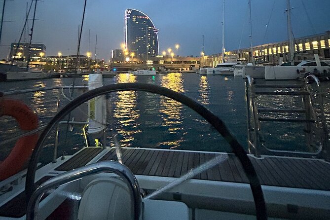 Barcelona: Sailing Tour with Tapas, Drinks, Swim & Sunset Option - Leaving Port Vell for open water