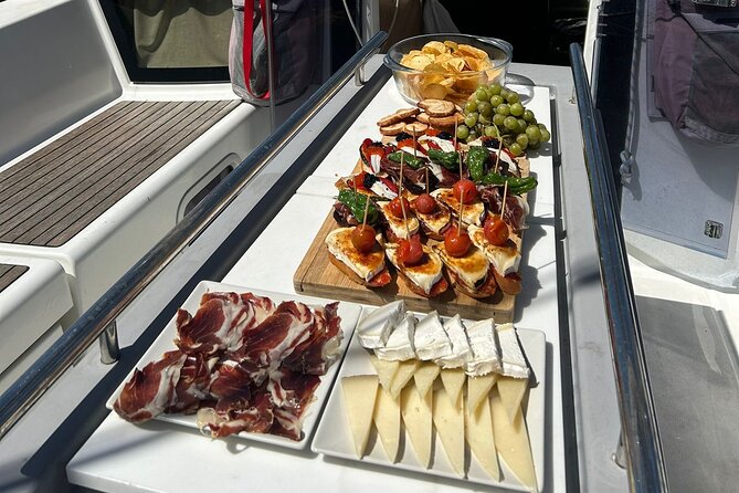Barcelona: Sailing Tour with Tapas, Drinks, Swim & Sunset Option - The swim stop on safe days