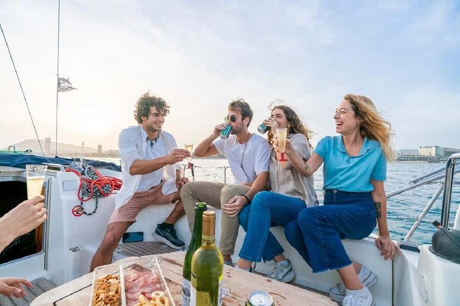 Barcelona: Sailing trip with GINTONIC workshop - Taking the wheel with the skipper nearby