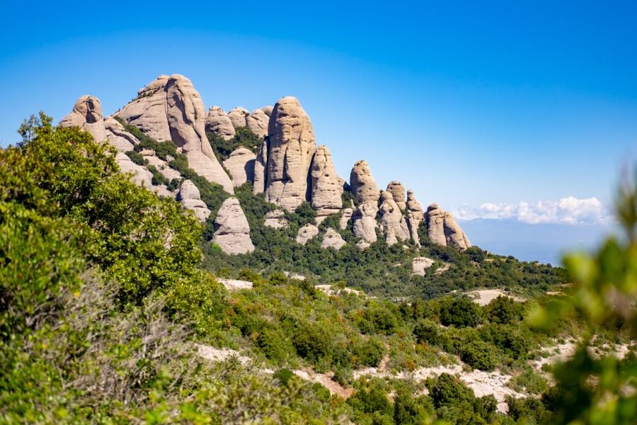 Barcelona: Sitges & Montserrat Monastery Tour with Easy Hike - Montserrat Monastery and the mountain walk