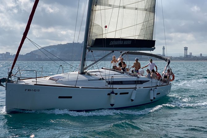 Barcelona Small Group Sailing with Snacks and Cava - Swimming beside the boat