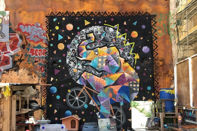 Barcelona Street Art Tour with Exclusive Artist Studios Visit - El Raval, where art appears in ordinary streets