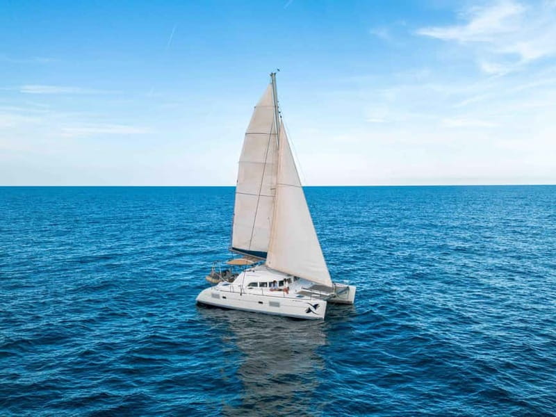 Barcelona: Sunset Catamaran Cruise with Wine and Tapa - Swimming, sea conditions, and practical comfort