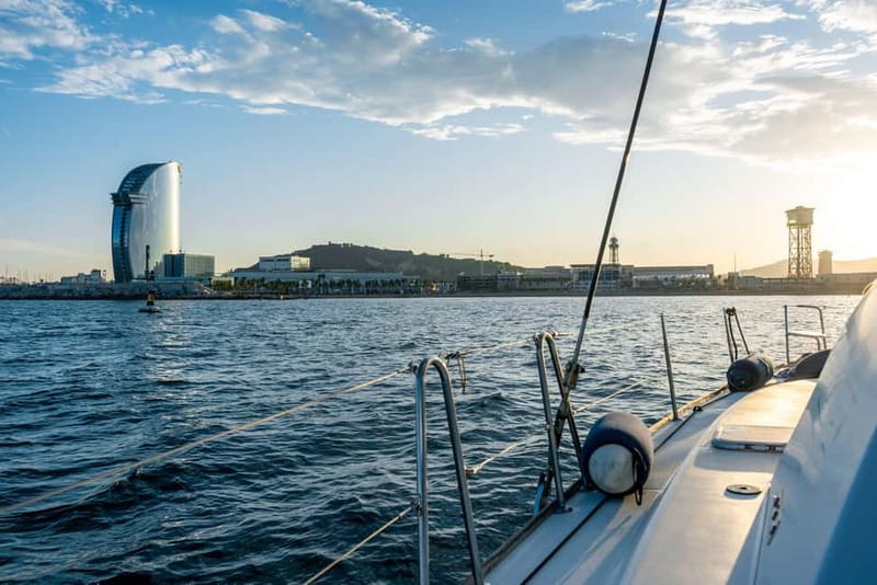 Barcelona: Sunset Catamaran Cruise with Wine and Tapa - What the crew adds to the experience