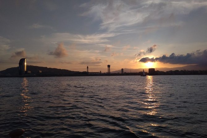 Barcelona Sunset Cruise with Light Snacks and Open Bar - Leaving the harbor for open sea