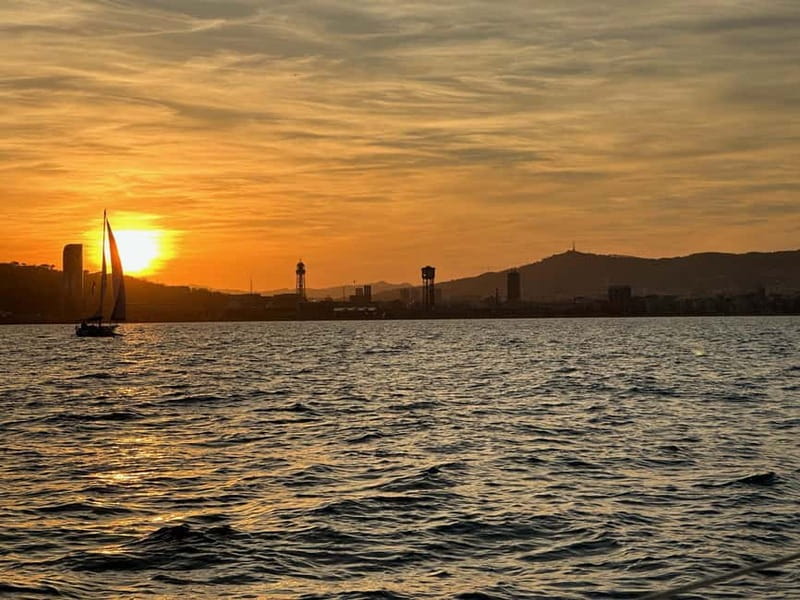 Barcelona: Sunset Sailboat Cruise with Open Bar and Snacks - Drinks, music, and the social mood