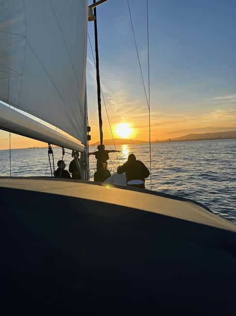 Barcelona: Sunset Sailboat Cruise with Open Bar and Snacks - What the captain adds to a short cruise